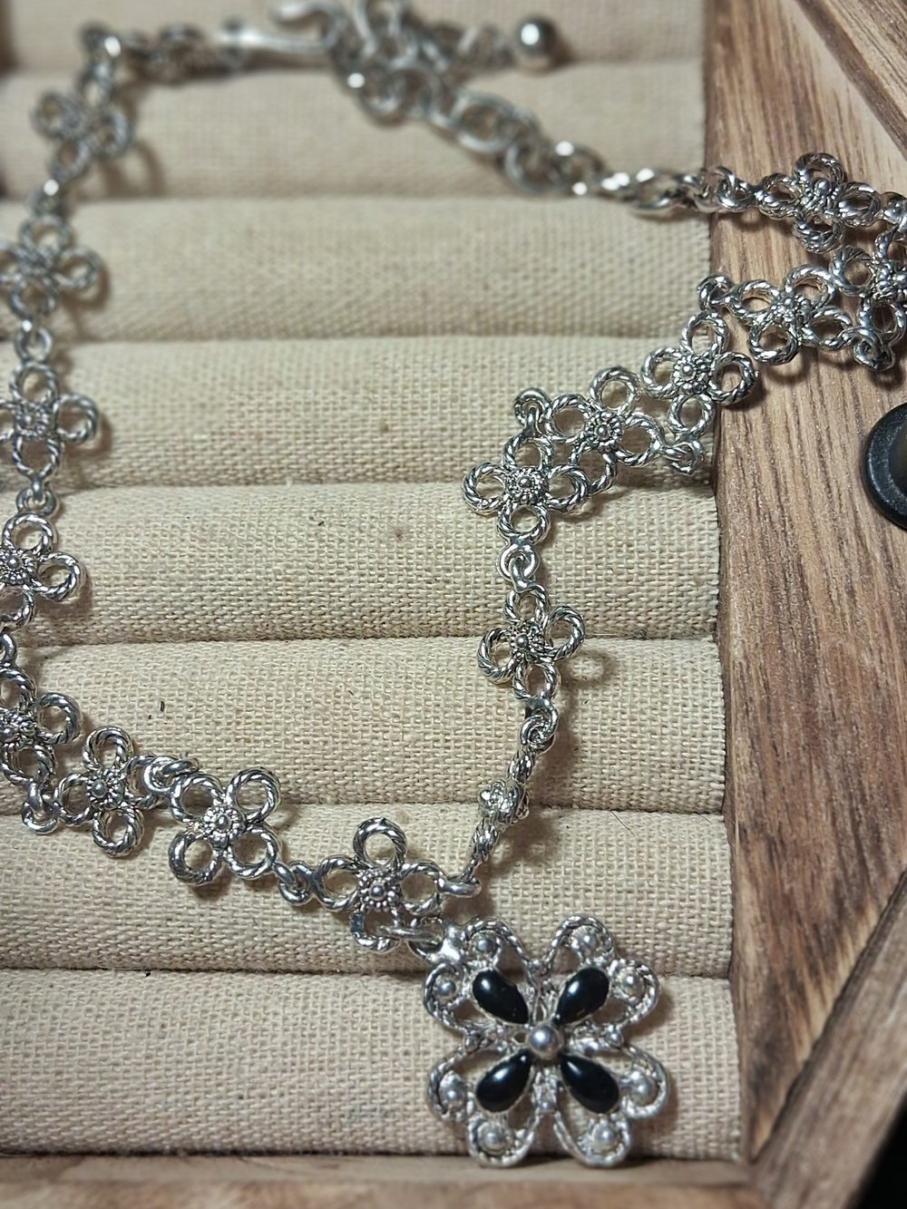 Floral Silver-Tone Necklace with Black Petal Accent